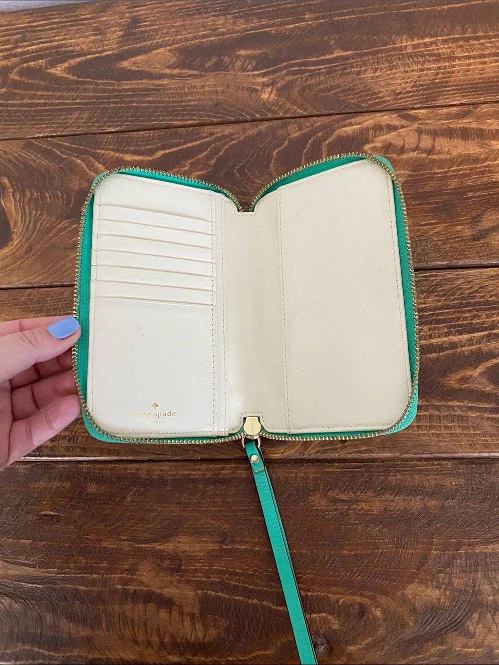 kate spade teal zip-around wristlet with strap